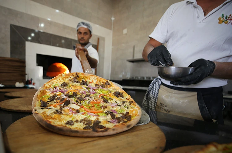 Süryani köylerinde odun ateşinde pizza modası